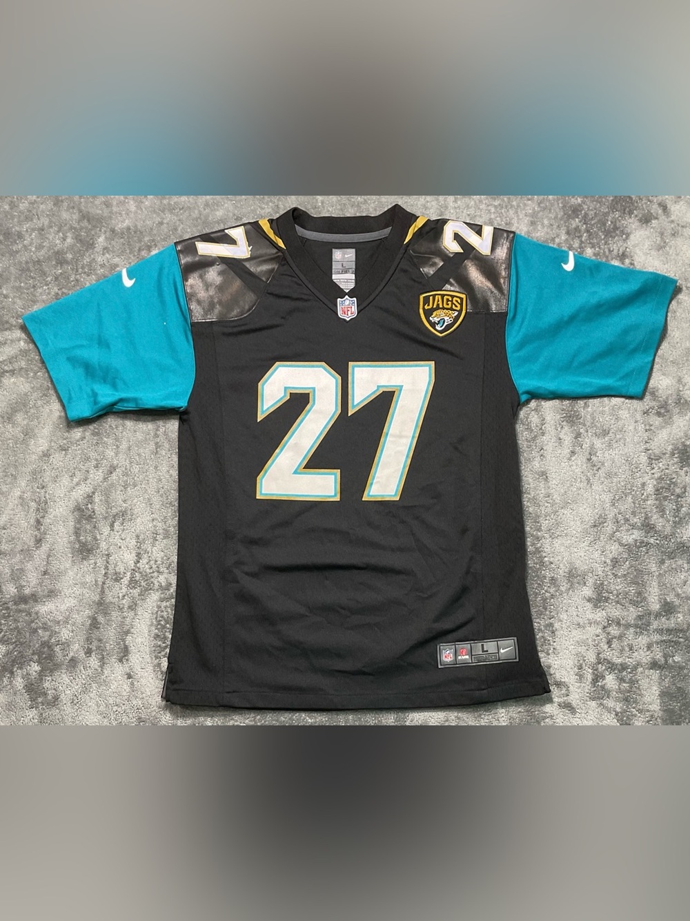 NFL Black Game Jersey with White and Blue Shield Accent